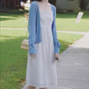 Blue cardigan with bowknot